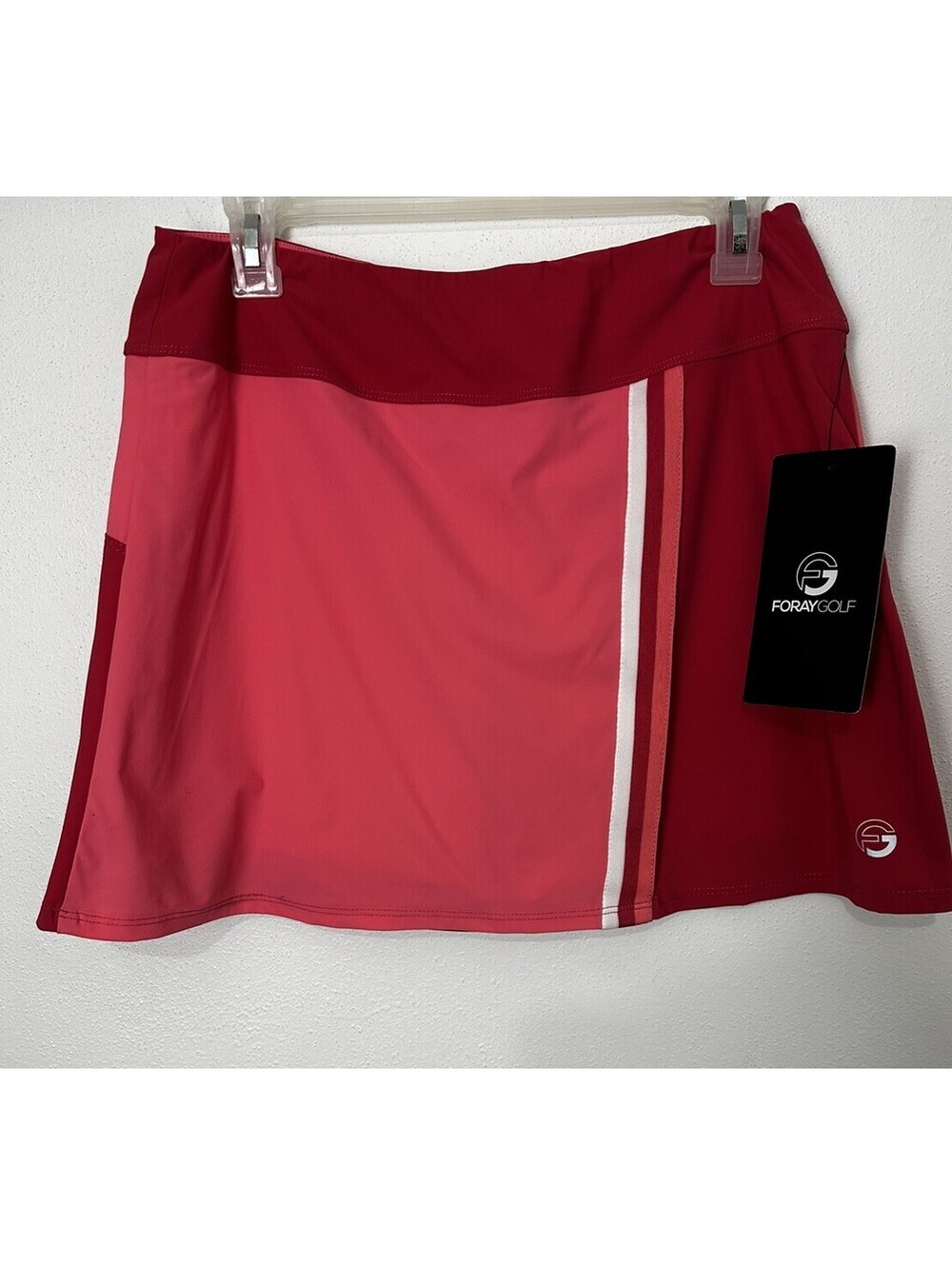 NWT WOMEN'S FORAY GOLF SKORT, SIZE: L COLOR: Flamingo/geranio
